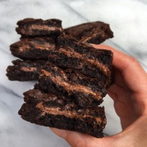 A stack of Gluten-free Chocolate Stuffed Brownies